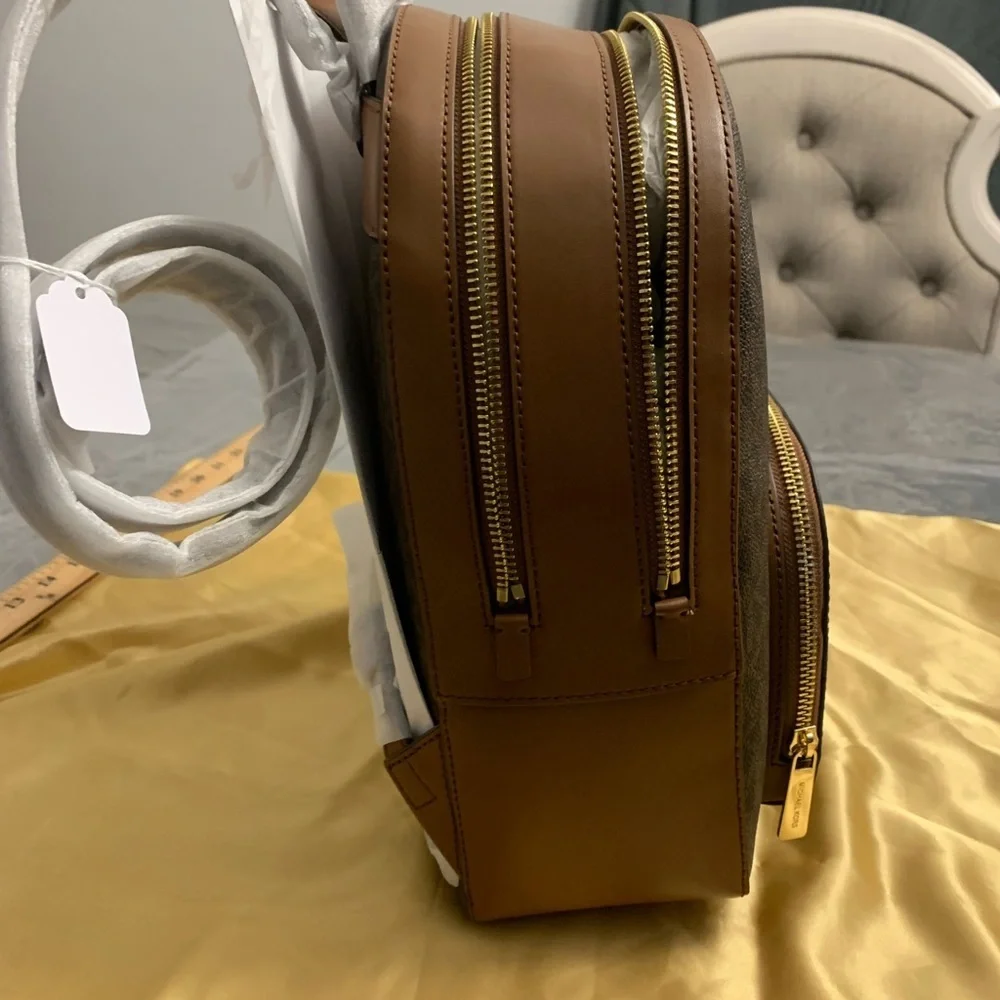 Michael Kors Jaycee Medium Brown Backpack with Monogram Pattern and Gold Zippers